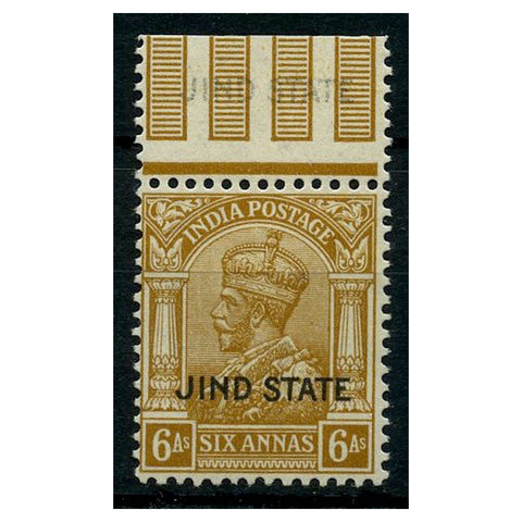 India (Jind) 1937 6a Bistre, marginal example with pale (albino) ovpt on marginal tab, u/m. SG95